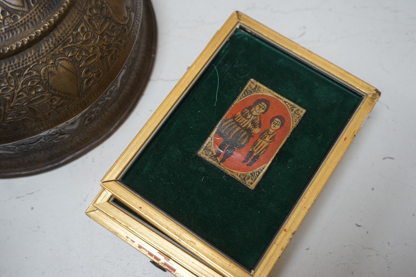 An Ethiopian Coptic processional cross, two Indian brass betel nut boxes together with other metalware and a set of miniature paintings, largest 51cm high. Condition - fair